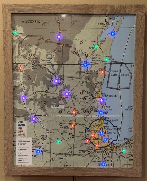 LED-illuminated map display showing real-time weather data
